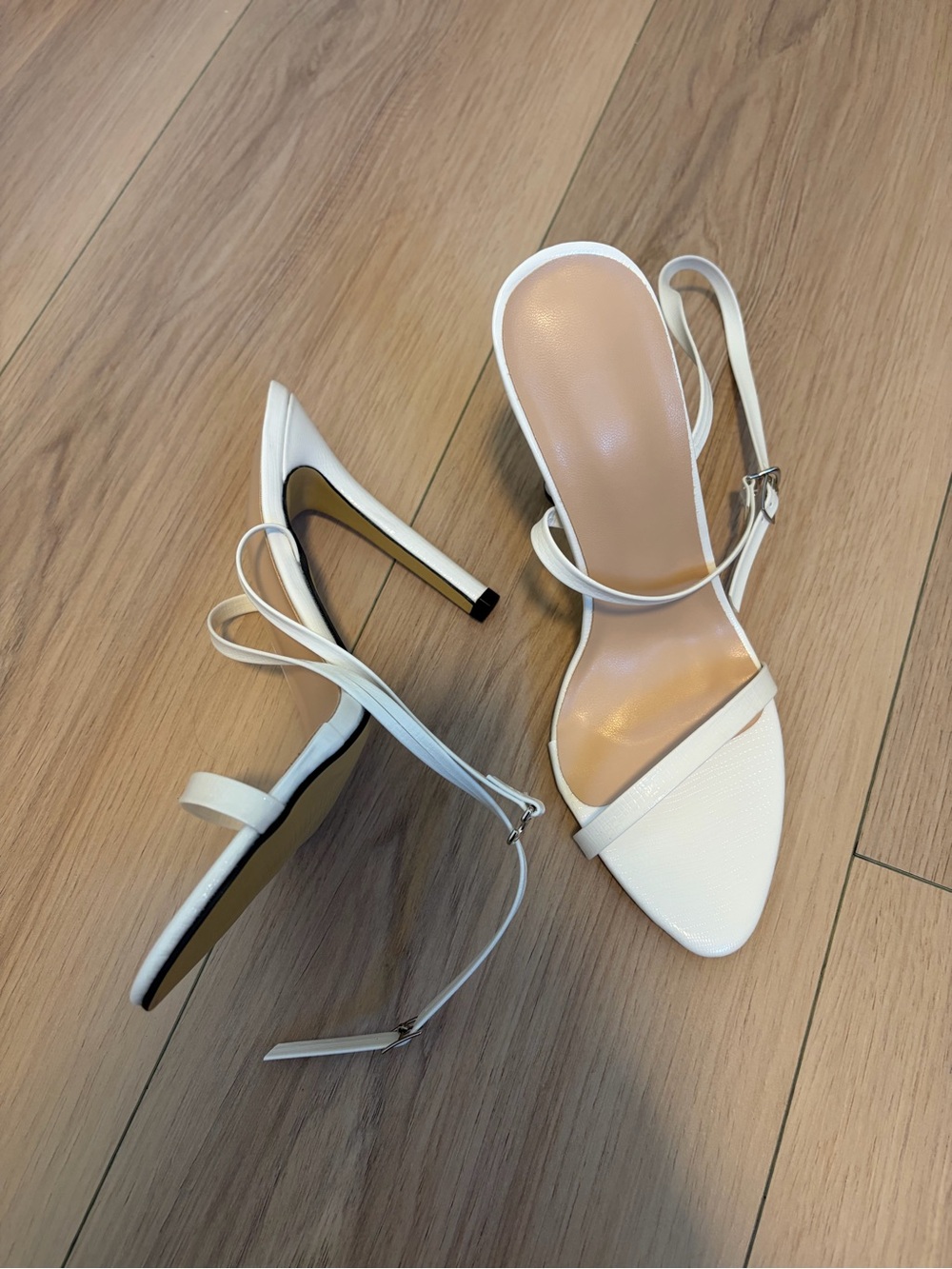 minimalist white strappy stiletto high-heel
